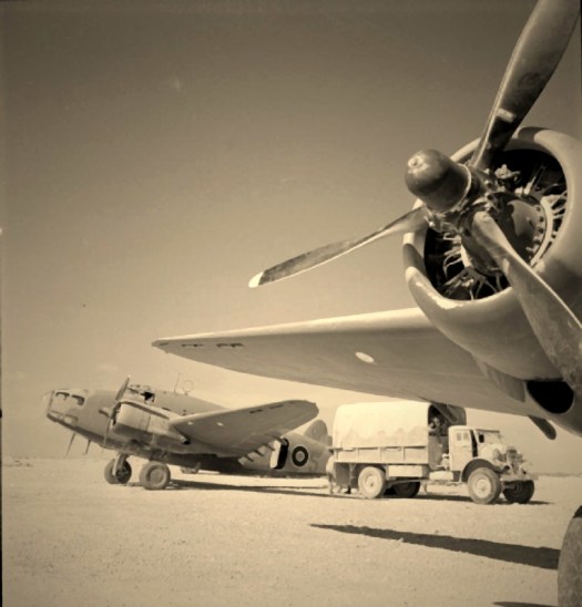 RAF aircraft being serviced at El Adem airfield in North Africa during mid-20th century Royal Air Force operations